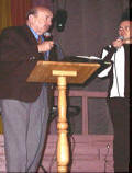 Tony Abram preaches at church plant crusade.