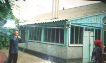 Kolotii: This building and lot cost $1,200.00