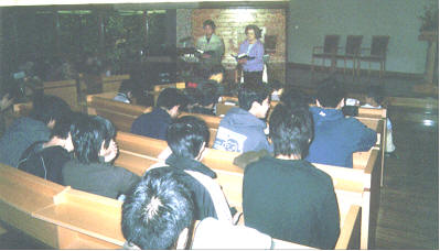 Marge teaches youth the Word of God in Japan.