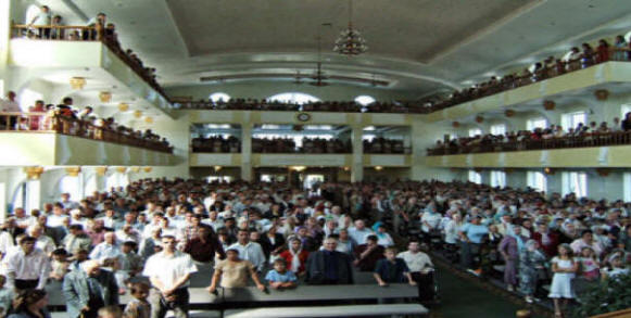 packed church meeting in ukraine